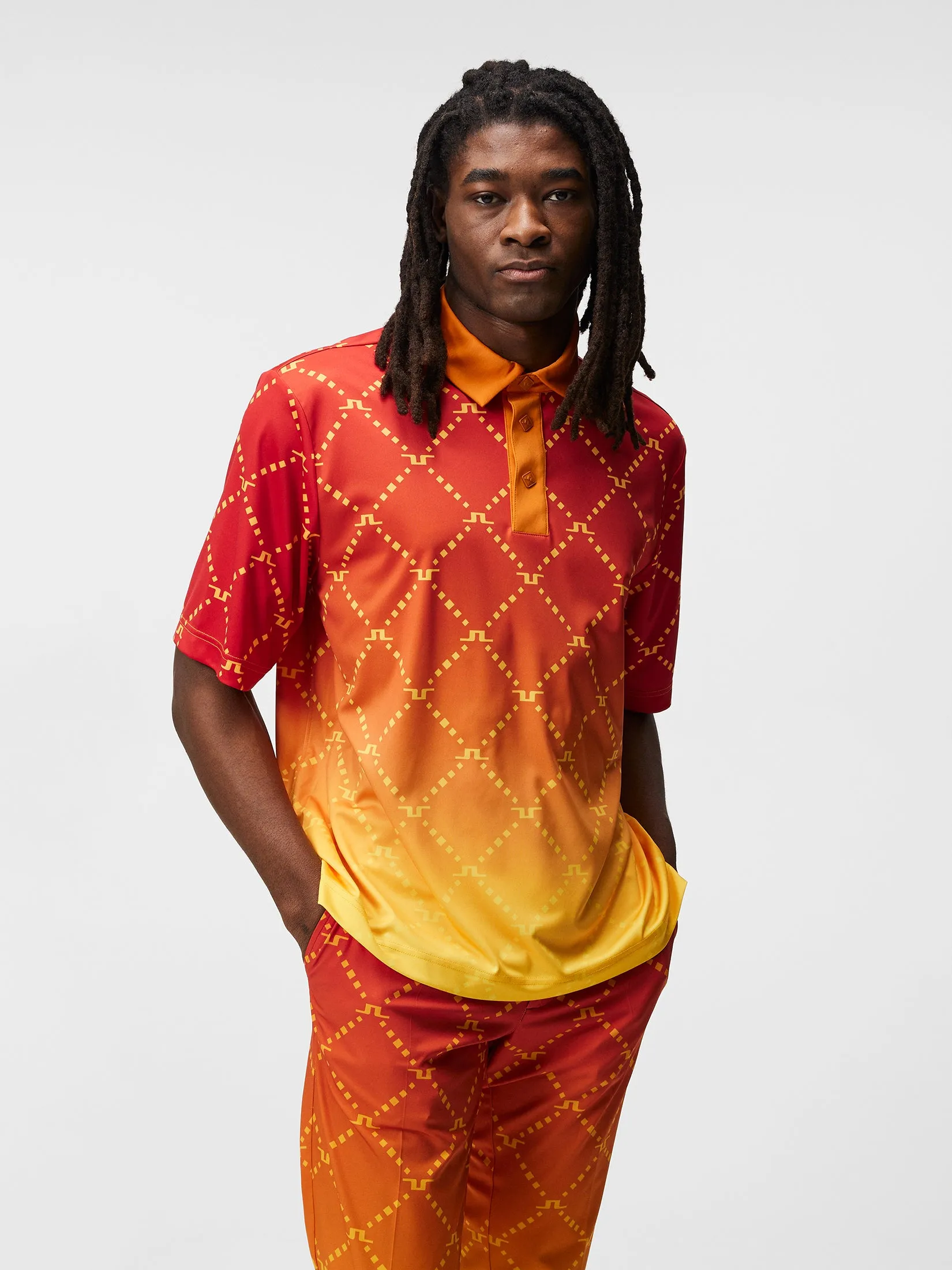 Sandy Polo / Sunset Fade logo